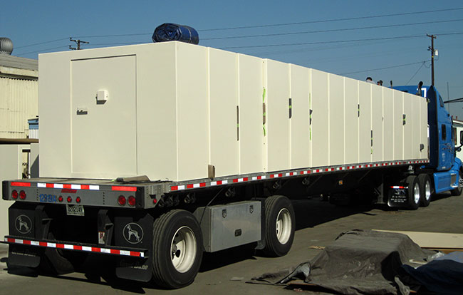 Tornado shelter safe rooms on truck for delivery to Oklahoma