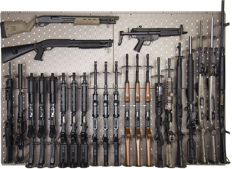 Tactical door back with rifles and shotguns on adjustable racks